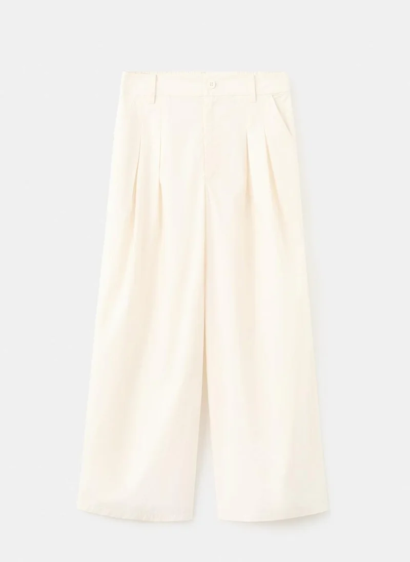 Mango  Wide leg cropped trousers with darts for Women | Best Price UAE